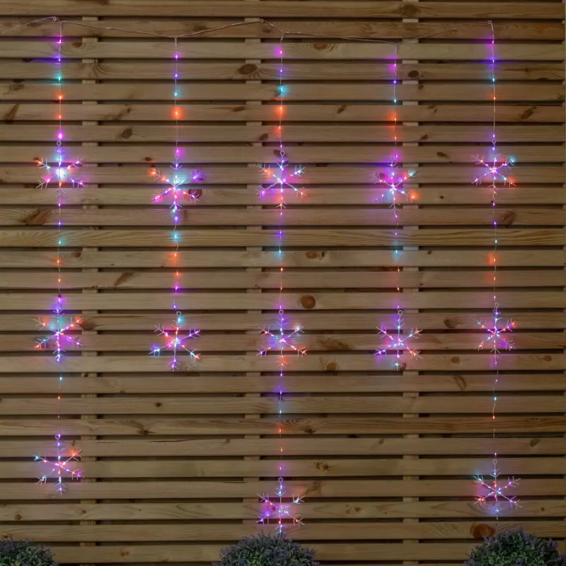 1.3m × 1.2m Light-Up Snowflake Curtain – 390 Twinkling Rainbow & Orange LEDs