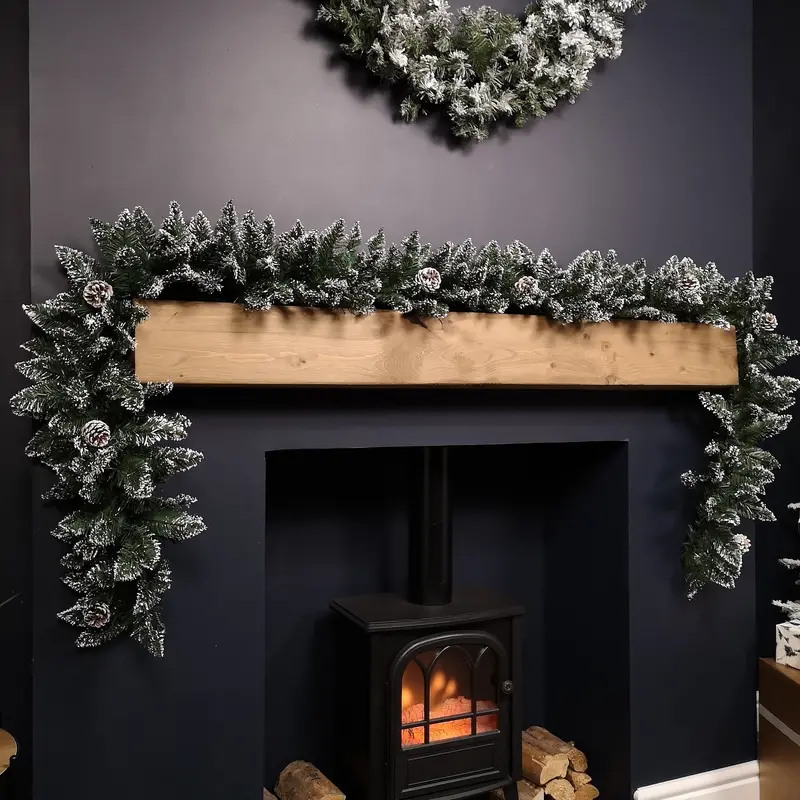2.7m Premier Rocky Mountain Garland: Snow-Flocked Pine with Natural Pinecones