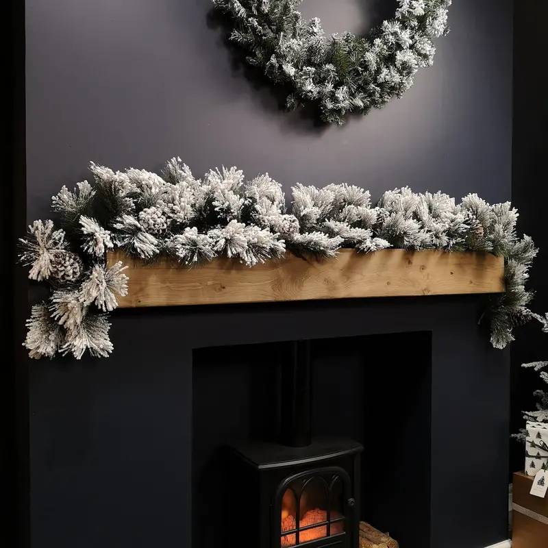 6ft Snow-Flocked Green Garland with Natural-Looking Pine Cone Accents