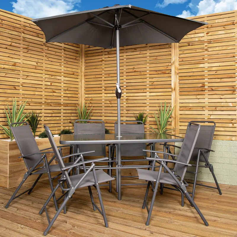 Samuel Alexander Grey Outdoor Patio Set: 6-Person Glass-Top Dining Table with Chairs and Umbrella